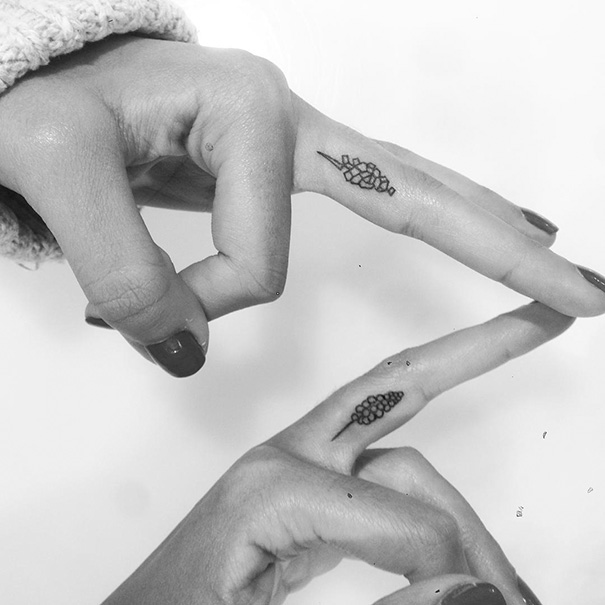 Two shape finger tattoos 