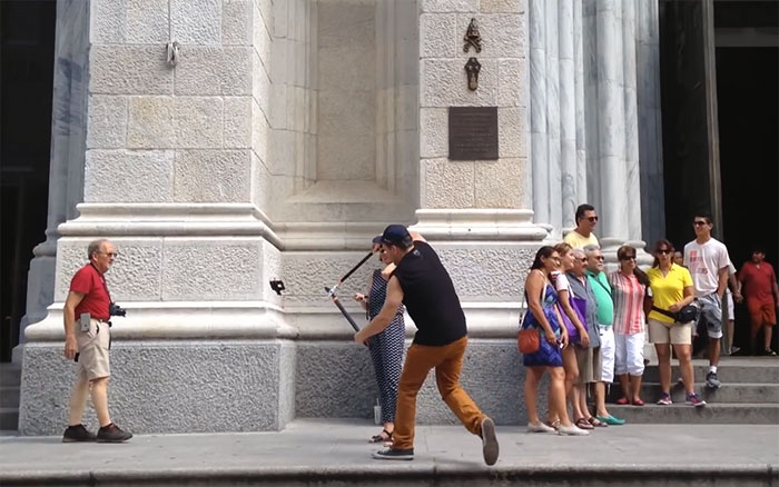 This Guy Is Cutting Tourists' Selfie Sticks In Half, And People Can't Decide If He's A Hero Or Villain