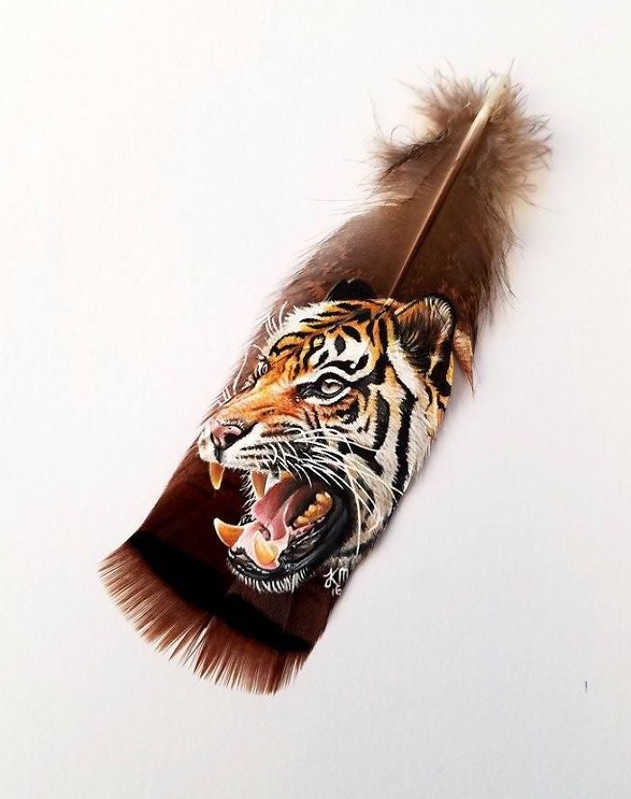 Pinto retratos realistas de animales sobre plumas delicadas
