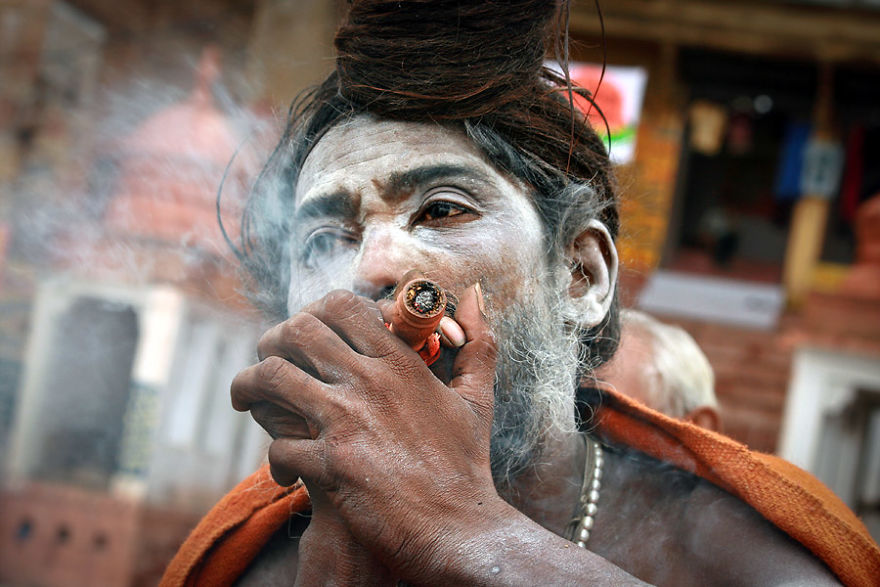 Sâdhu Smoking Shilom On The Banks Of The Ganges, India