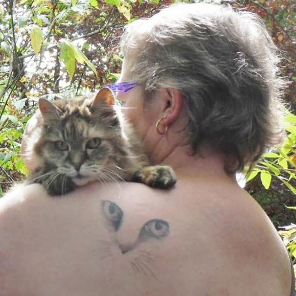 Cat face back shoulder tattoo