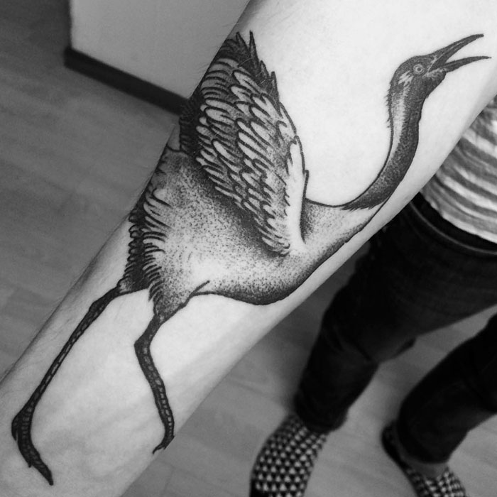 Bird hand tattoo