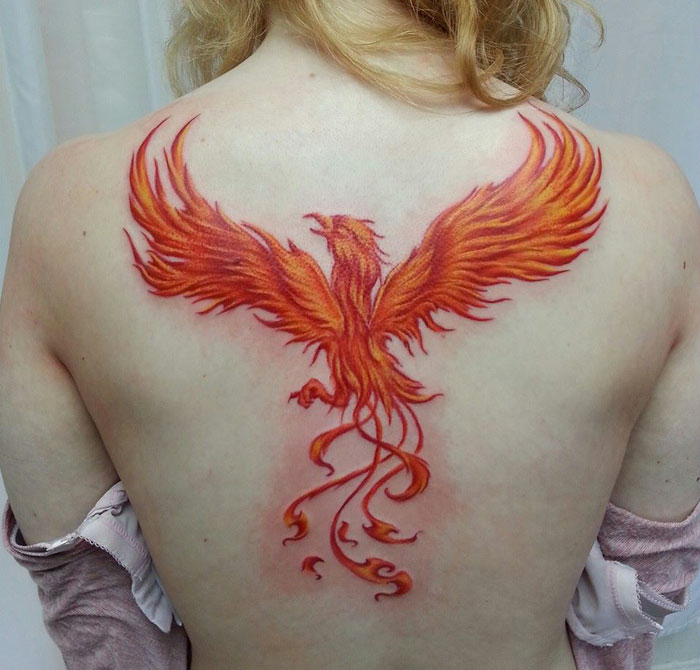 Red phoenix back tattoo