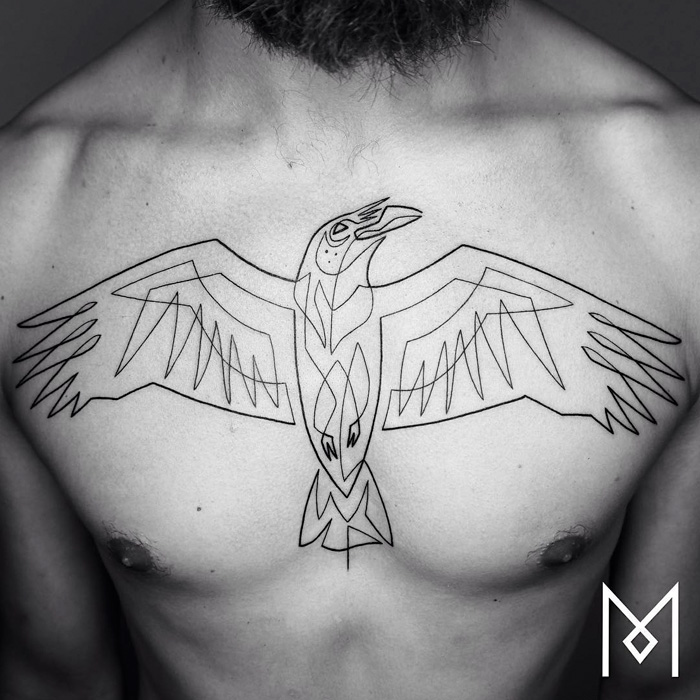 Chest bird tattoo 