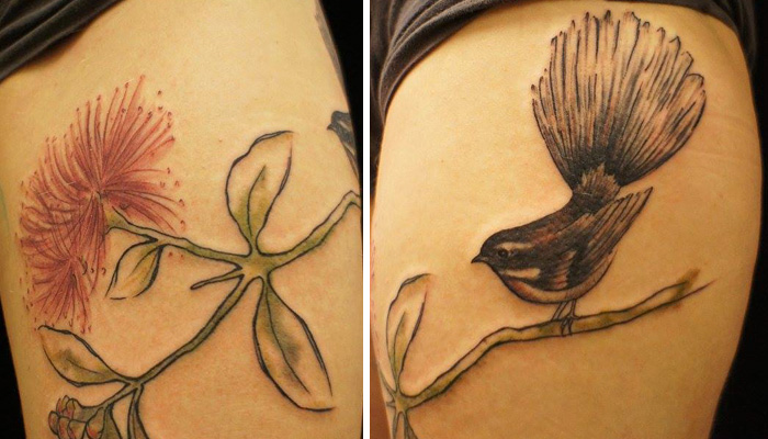 Colorful bird and flower leg tattoo 