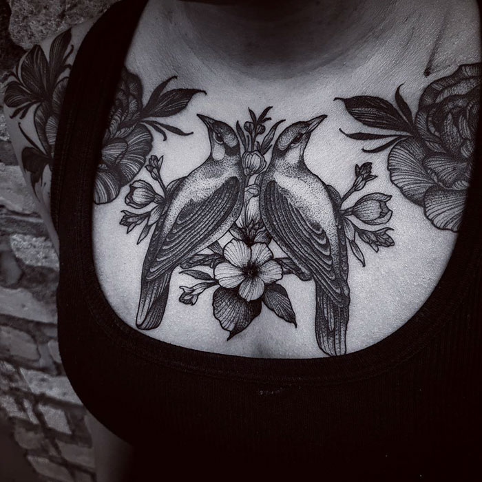 Bird chest tattoo 