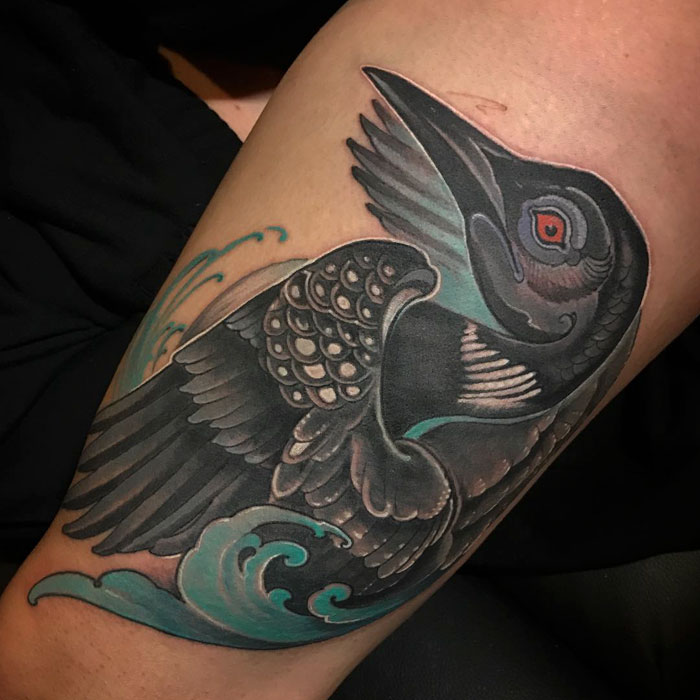 Crow hand tattoo 