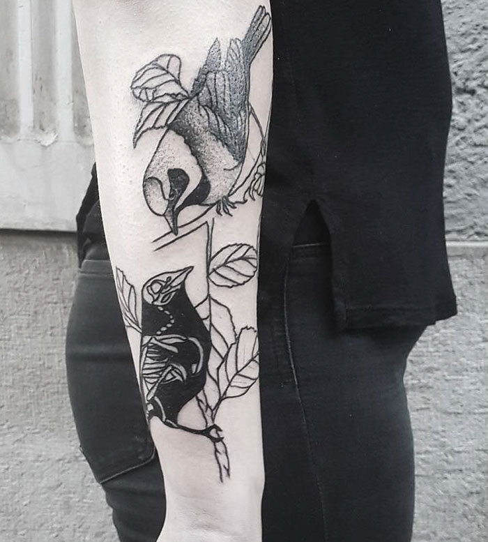 Arm bird tattoo 
