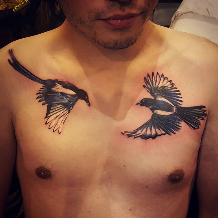 Chest bird tattoo 