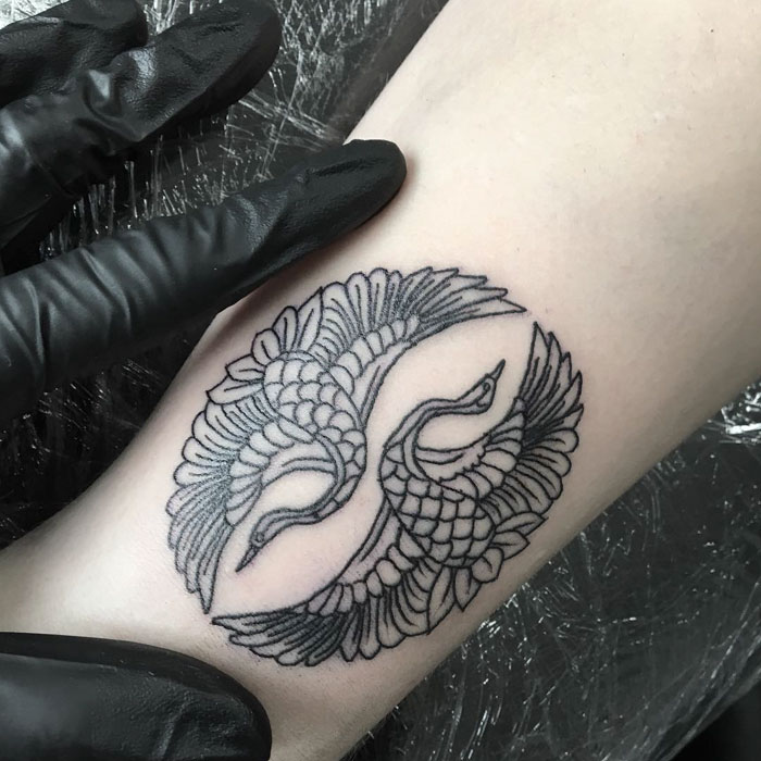 Small bird hand tattoo 