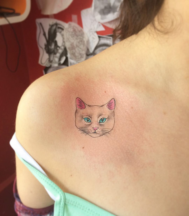 White cat with blue eyes shoulder Tattoo
