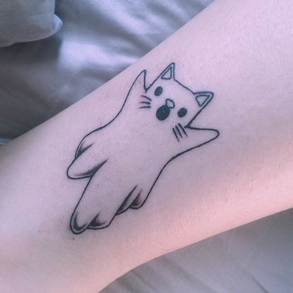 Cat ghost arm tattoo