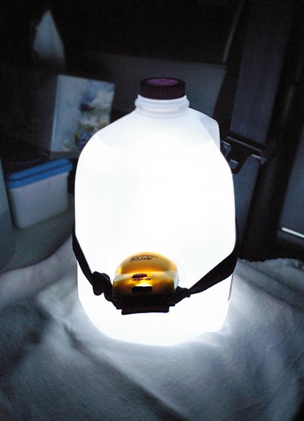Place A Headlight Facing Inwards On A Water Jug For An Ambient Camping Light
