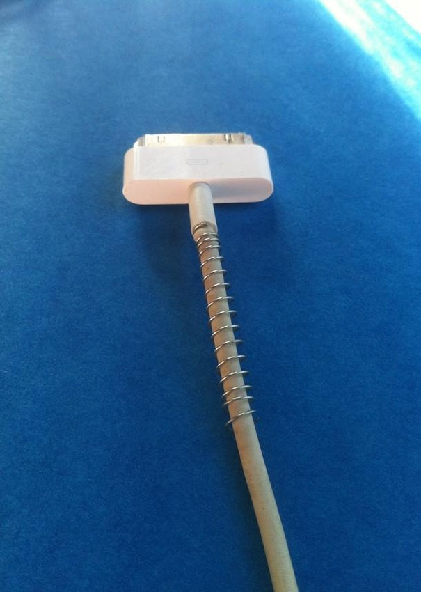 Use A Spring From An Old Pen To Keep Your Charger From Bending And Breaking