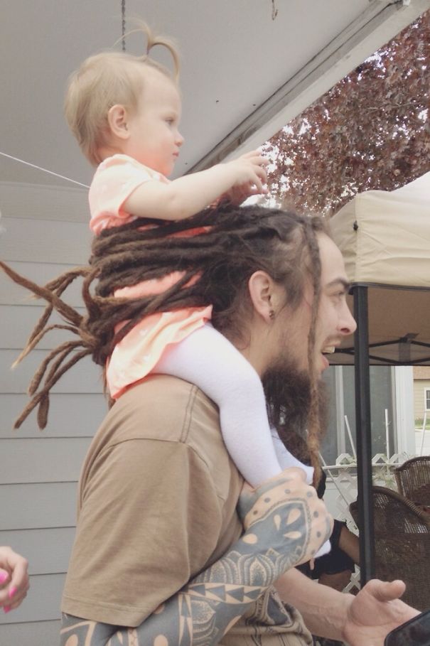 Man uses dreads as a baby safety device