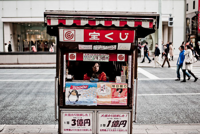 Small street photography shot of a Japanese lottery booth capturing authentic Japan street scenes and local daily life.