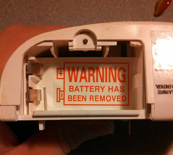 Picture of sign that says warning battery has been removed