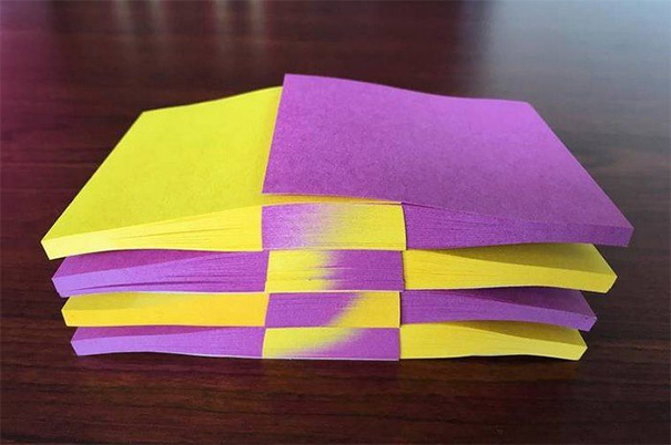 Interleaved Sheets Of Coloured Paper