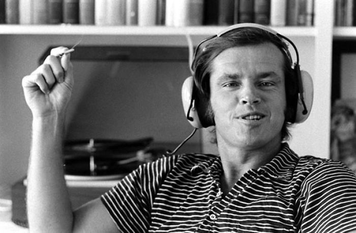 32-Year-Old Jack Nicholson Grins Broadly As He Smokes And Listens To Music On A Pair Of Headphones In His Home, Los Angeles, California, 1969