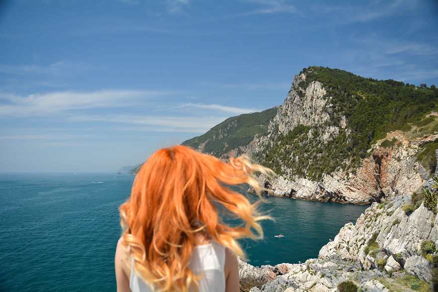 Photographer Captures His "Favourite 10 Travelling Views" Using Back Views Of Redhair Girlfriend
