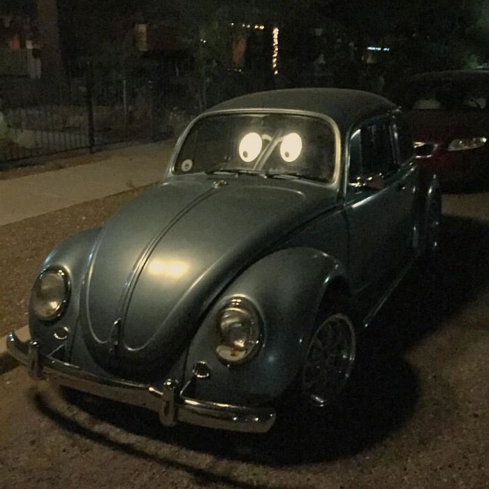 The Reflection From The Street Lamps Makes This Vw Bug Look Like It Has Cartoon Eyes