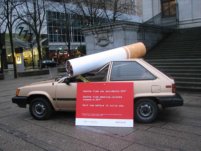 A Car, Crushed By A 7-Foot Cigarette, Grabbed Attention For National Non-Smoking Week And The British Columbia Lung Association