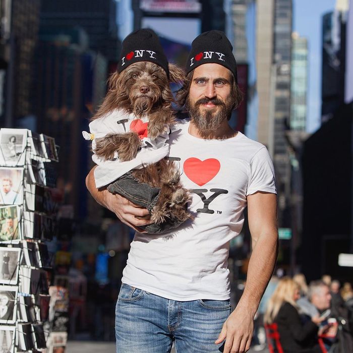 Dog And Human Dressed In Matching Outfits