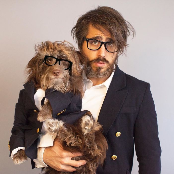 Dog And Human Dressed In Matching Outfits