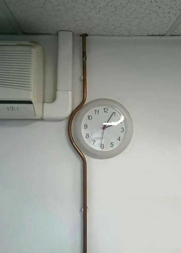 This Pipe Was Bent To Go Around The Clock Instead Of Just Removing The Clock And Going Straight Up