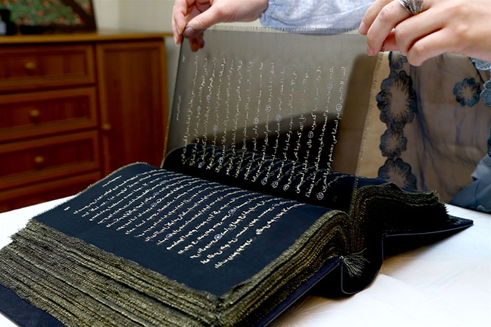 Artist Spends 3 Years Rewriting The Entire Quran In Gold On 164 Feet Of Silk By Hand