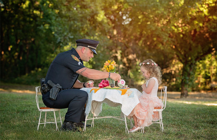 This 2-Year-Old Girl Threw A Tea Party For A Cop Who Saved Her Life