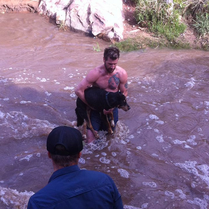 This Man Who Undresses And Jumps Into Cold River To Save Drowning 13-Year-Old Dog