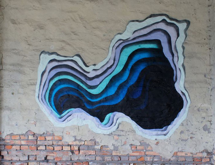 Street Artist Spray-Paints Boring Buildings With Optical Illusions That Look Like 3D Portals