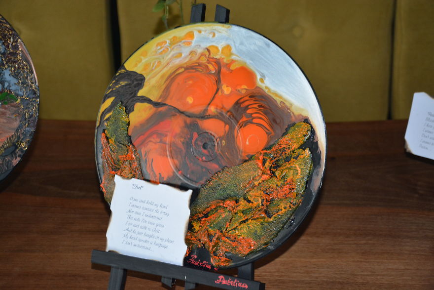 Artist Uses Old, Damaged Records As Canvas To Paint Her Travelogues