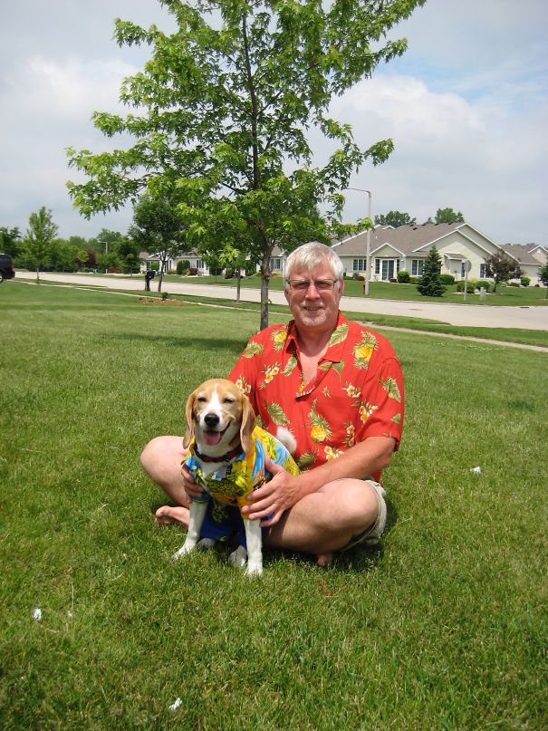 My Dad With The Dog That He Didn't Want... Yes They Are Wearing Hawaiian Shirts. And Yes The Dog Is Wearing Swimming Trunks.