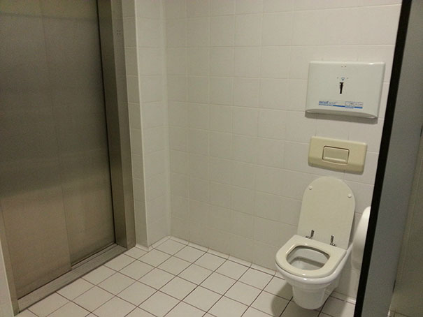 This Toilet Stall Has An Elevator Inside