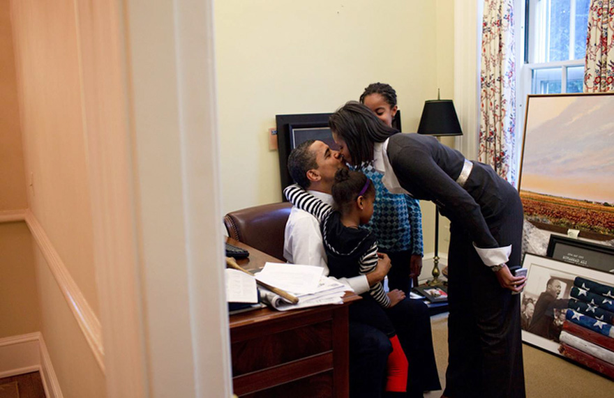 President Barack Obama Visits With His Daughters Malia And Sasha And Kisses His Wife, First Lady Michelle Obama, In A Private Study Off The Oval Office, Feb. 2, 2009