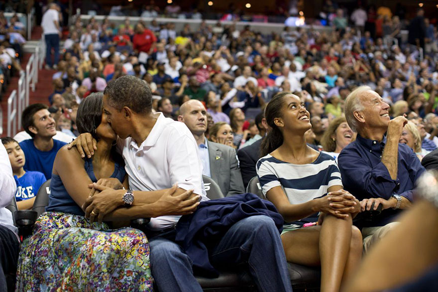 Barack Obama Kisses Michelle Obama For The “Kiss Cam” While Attending The U.S. Men’s Olympic Basketball Team’s Game Against Brazil At The Verizon Center In Washington, On July 16, 2012