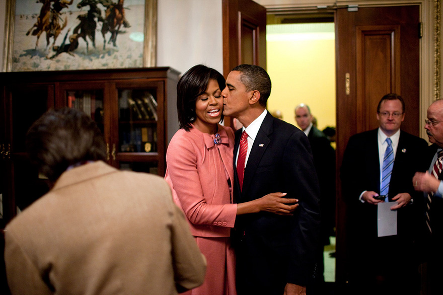 President Barack Obama Kisses First Lady Michelle Obama