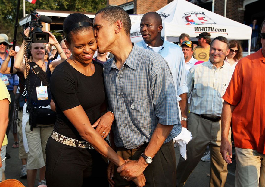 Barack Obama Gives His Wife Michelle A Playful Kiss As They Tour The Iowa State Fair On Aug. 16, 2007 In Des Moines, Iowa