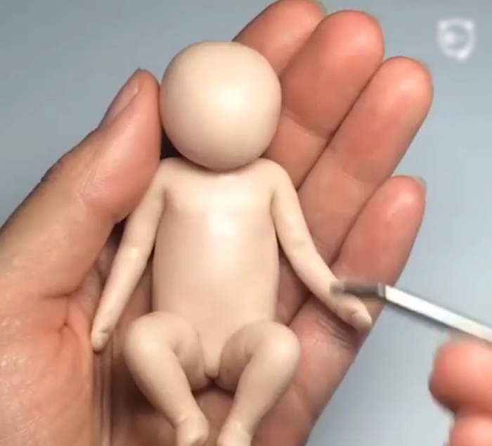 Artist Sculpts Tiny Babies