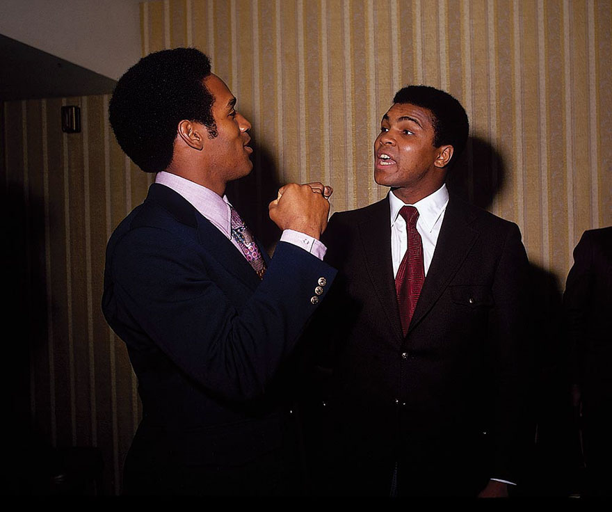 Muhammad Ali Engages In Friendly Banter With Football Star O.J. Simpson In January Of 1971