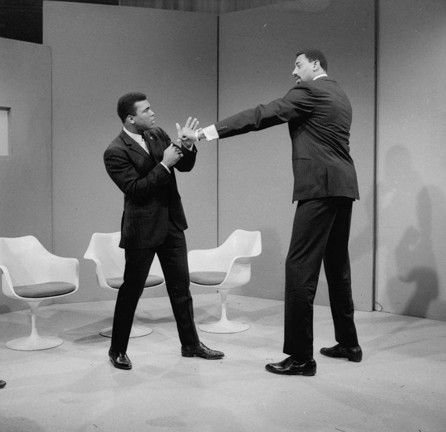 Basketball Star Wilt Chamberlain Extends A Long Left In The Direction Of World Heavyweight Champion Muhammad Ali As They Met At An Abc Television Studio In New York, March 10, 1967. Chamberlain Stands 7 Feet, 1 Inch Tall, And Ali Is 6 Feet, 2 Inches Tall. Chamberlain's Reach Is Over 90 Inches, Ali's Is 79 Inches.
