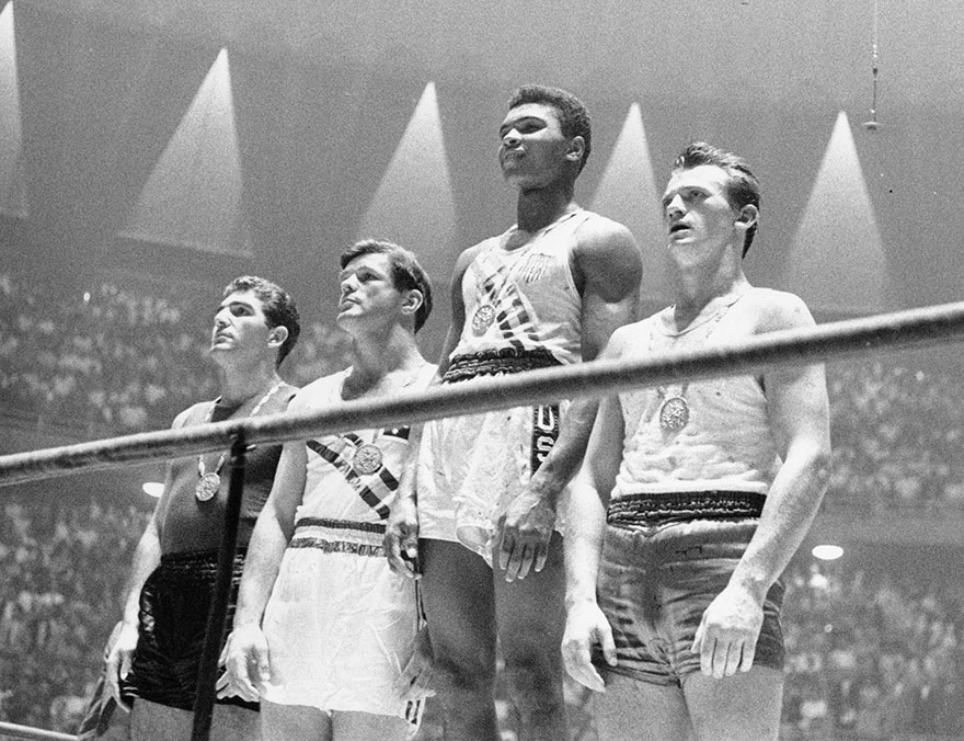 As A Bubbly Teenager At The 1960 Olympics In Rome, Clay Parroted America’s Cold War Line. He Took The Gold Medal For Light Heavyweight Boxing, Beating Out Zbigniew Pietrzykowski Of Poland, Right, And The Joint Bronze Medalists Giulio Saraudi Of Italy And Anthony Madigan Of Australia