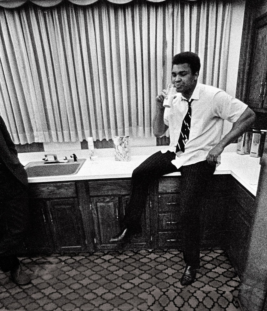Ali Relaxes With A Glass Of Milk In His Kitchen In Philadelphia, Pennsylvania, February 1970