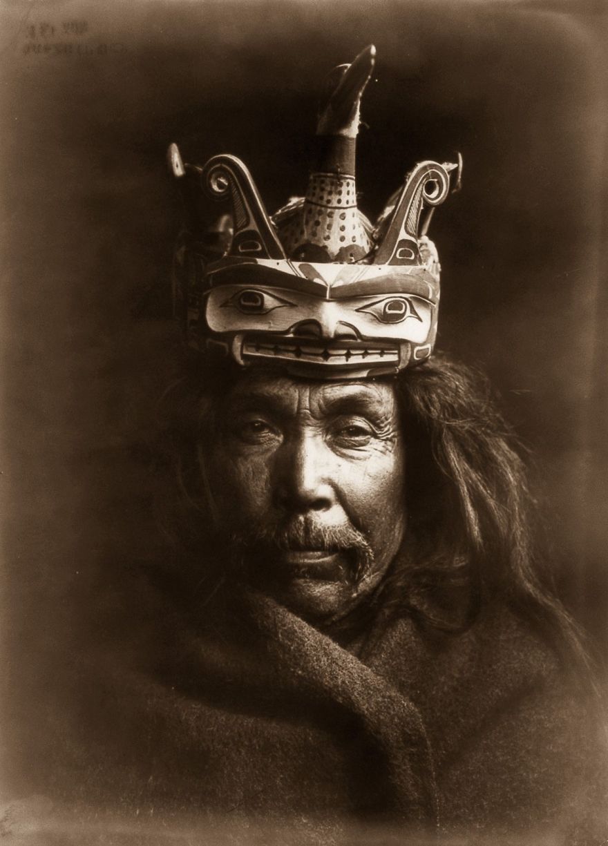 A Kwakiutl Man Wearing A Mask Depicting A Man Transforming Into A Loon, 1914