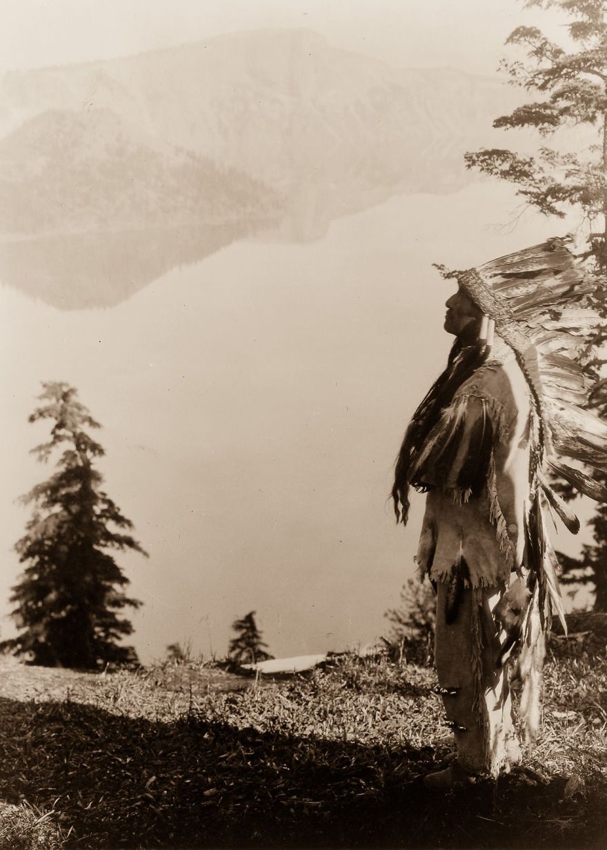 A Klamath Chief Stands On A Hill Above Crater Lake, Oregon, 1923