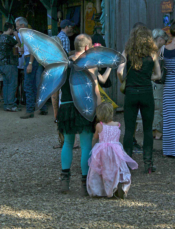 Single Father With His Daughter, Dressed As A Fairy And Princess