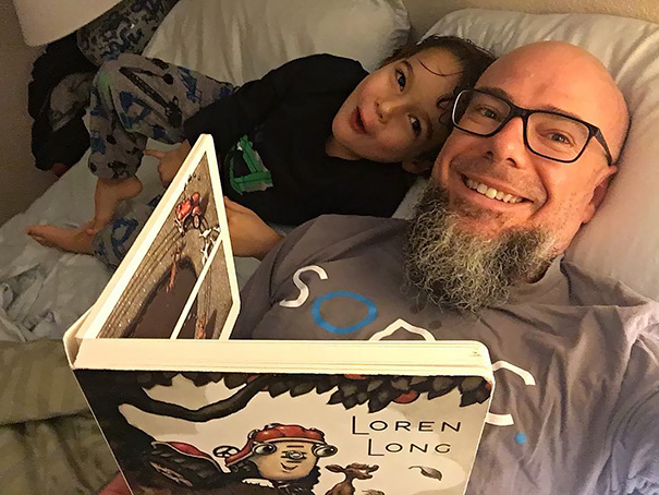 Single Dad's And Son's Book Ritual Before Bed Time