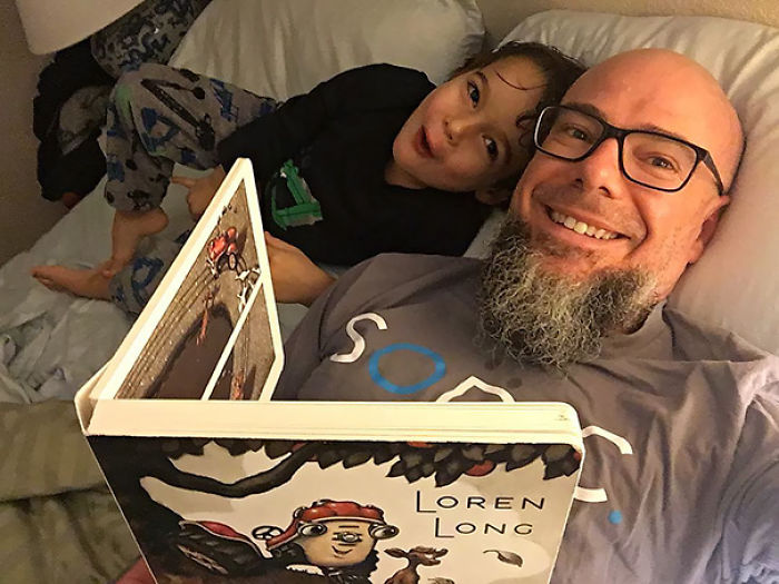 Single Dad's And Son's Book Ritual Before Bed Time